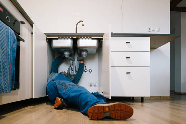 Professional Emergency Plumber technician working in Claymont, DE